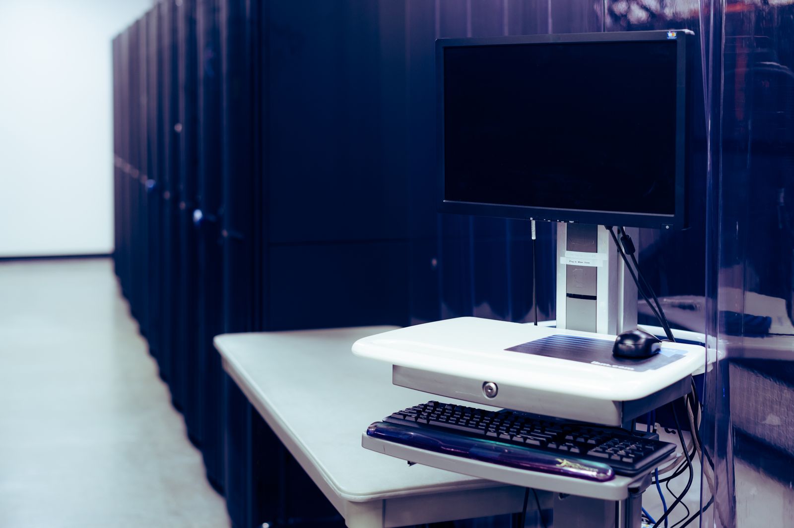 Server racks and network equipment in an internal IT room
